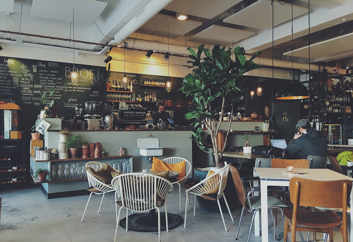 Hougang kopitiam near the MRT, empty tables in the early morning